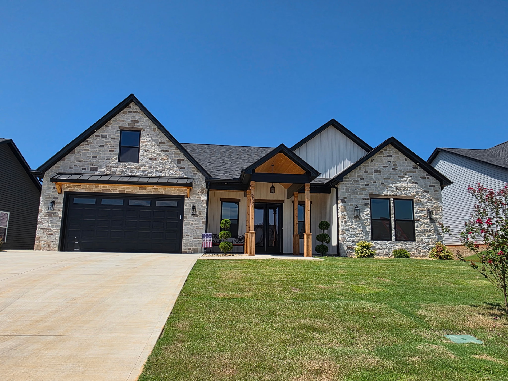 Manufactured stone veneer across the front elevation of a completed home